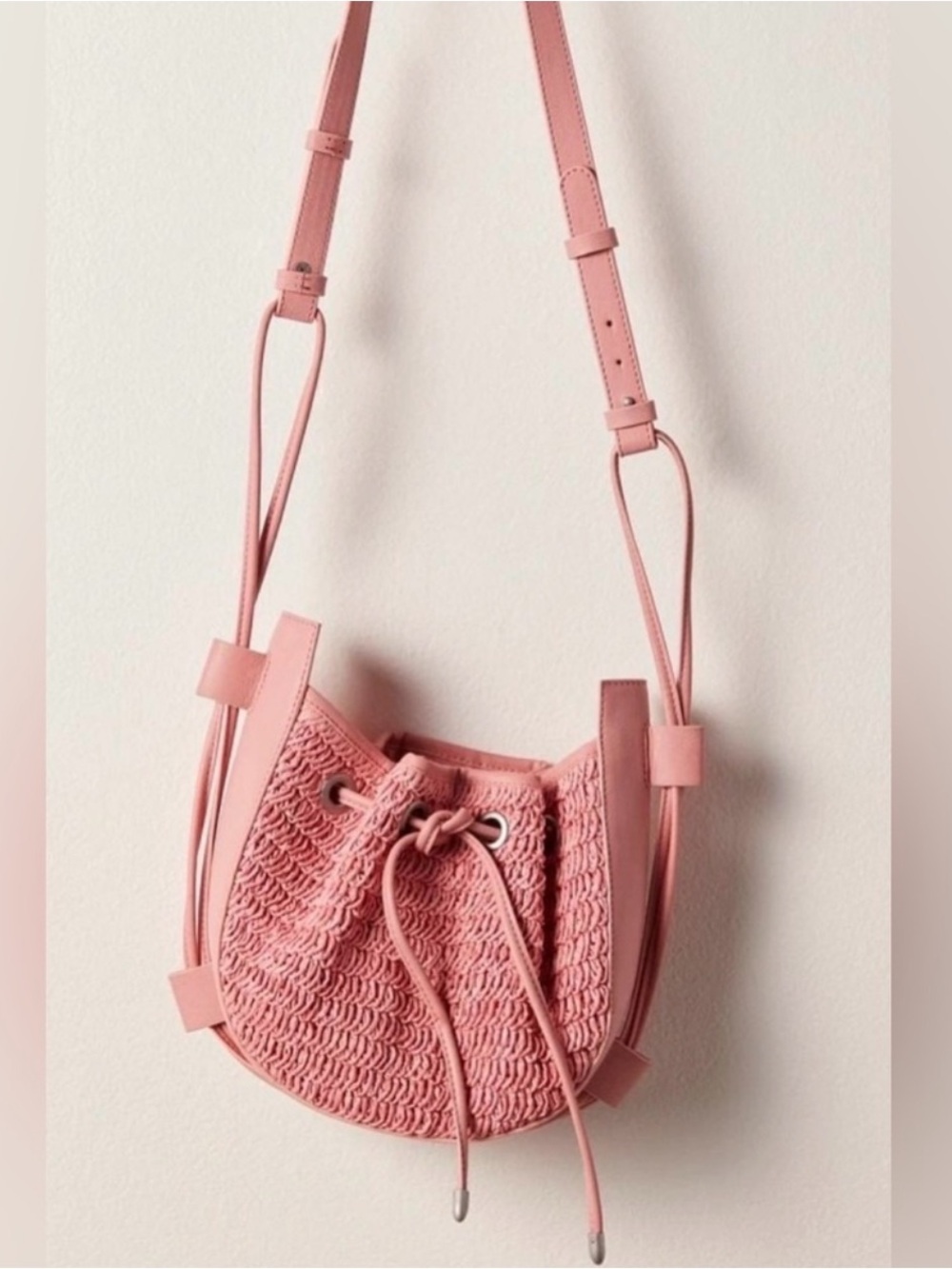 Free People Cabana Woven Drawstring Crossbody Bag in Pink